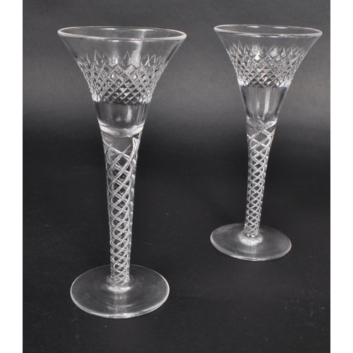 391 - A collection of seven 19th century George III cut glass pieces, comprised of four crystal twist stem... 