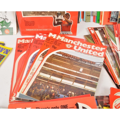 396 - A collection of late 20th century football programmes, majority being Manchester United, with other ... 