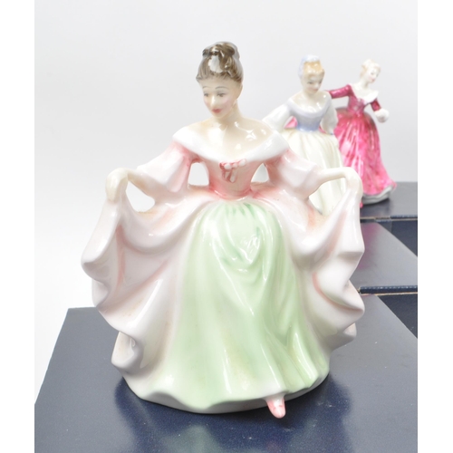 4 - Royal Doulton - A collection of nine late 20th-century bone china lady figurines, to include: HN 327... 