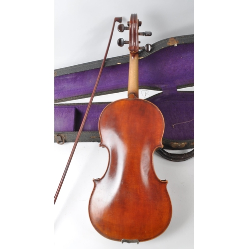 401 - An early 20th century French JTL Jerome Thibouville Lamy Medio Fino violin. The violin in fitted cas... 