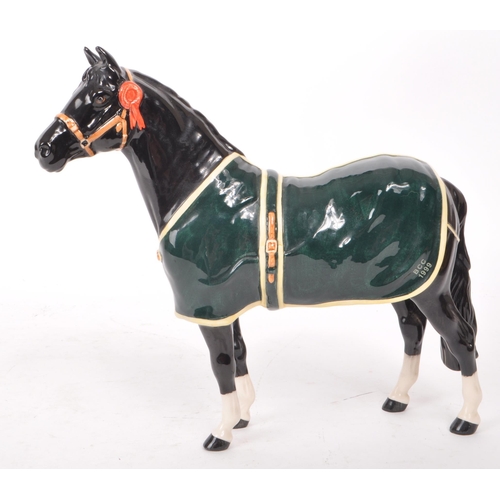 41 - Beswick - A 1999 black gloss china 'Champion Welsh Mountain Pony' limited edition out of 580. Makers... 