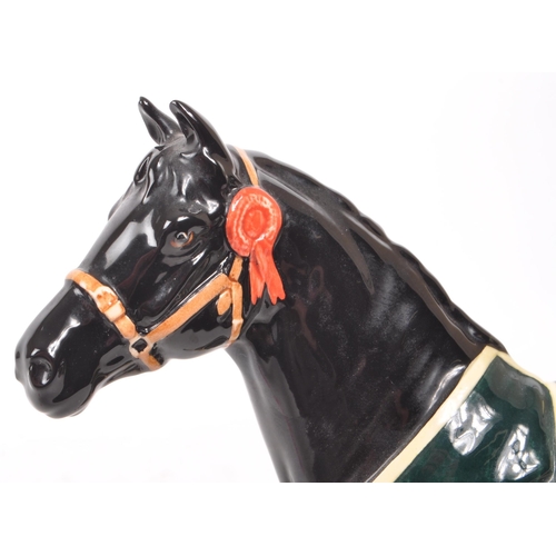 41 - Beswick - A 1999 black gloss china 'Champion Welsh Mountain Pony' limited edition out of 580. Makers... 