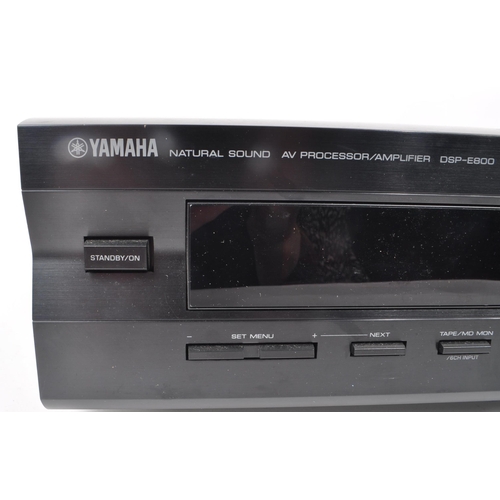 412 - YAMAHA - A late 20th-century DSP-E800 AV processor / amplifier, with the owner's manual, cable, and ... 