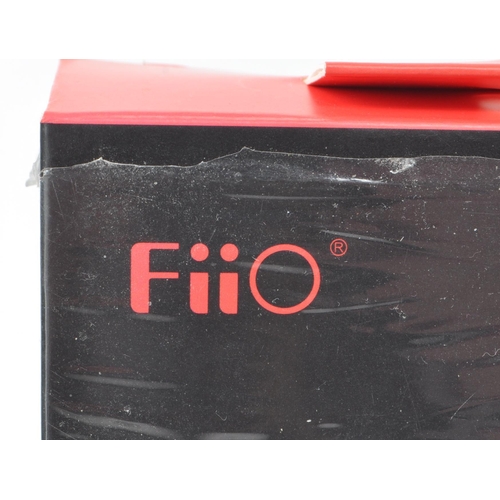 414 - Two 2013 / 2014 FiiO E12 mont blanc and E12A mont blanc for IEM portable headphone amplifiers. Profe... 