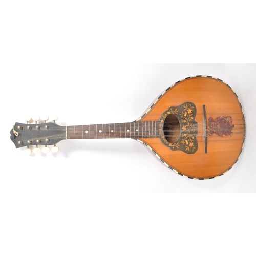 421 - A vintage 20th century flat backed mandolin instrument with an inlaid floral scratch plate, inlaid m... 