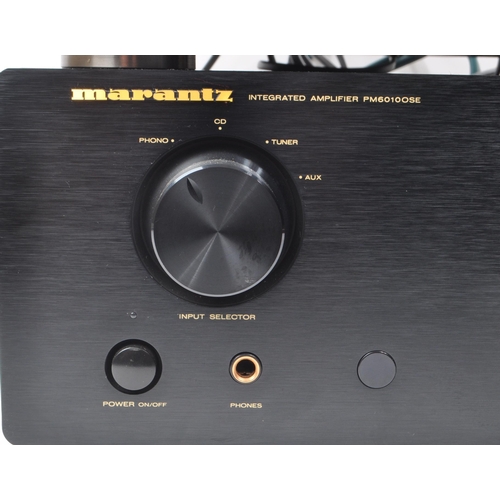 431 - A late 20th / 21st century Hi-Fi audio music stacking system, comprised of a 2020 Marantz Integrated... 