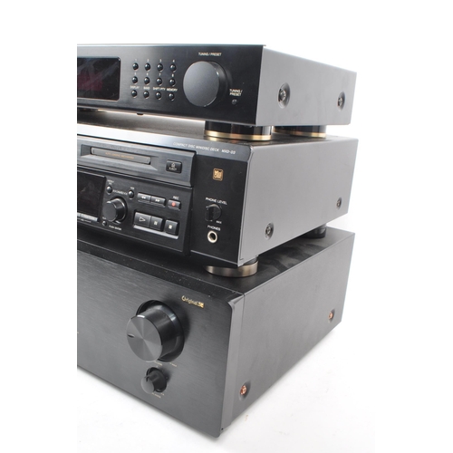 431 - A late 20th / 21st century Hi-Fi audio music stacking system, comprised of a 2020 Marantz Integrated... 