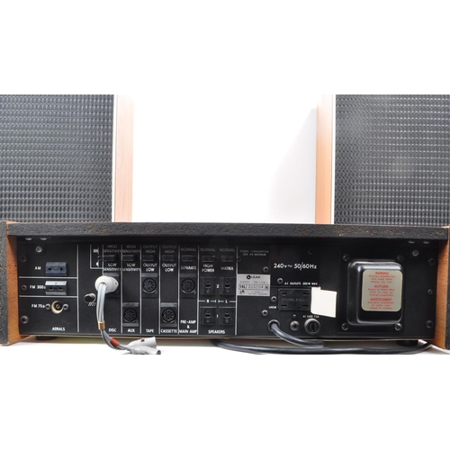 432 - Leak - A 1960s '2000 tuner amplifier', and two 1970s '2030' speakers no. 029260. Both systems are en... 