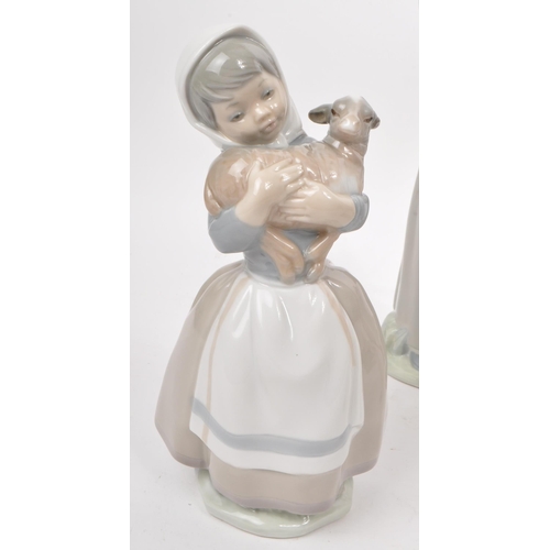 438 - Lladro - Nao - Collection of seven late 20th century porcelain figurines, comprised of two small goo... 