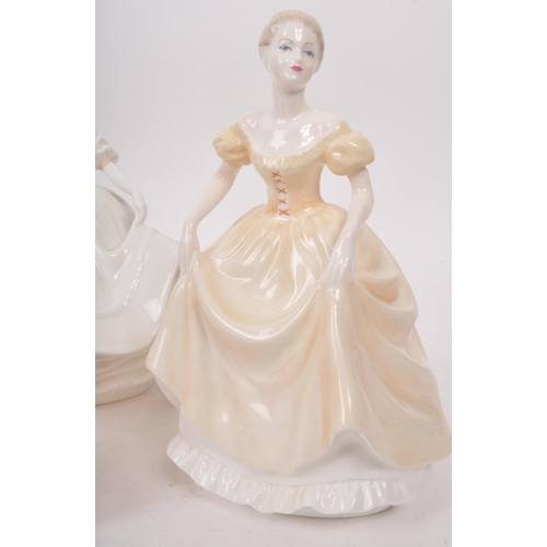 440 - A collection of six late 20th century porcelain lady figurines, comprised of three Royal Doulton and... 