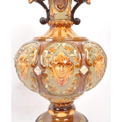 441 - Wilhelm Schiller & Sons - A pair of late 19th century majolica twin handled vases, numbered 2176... 