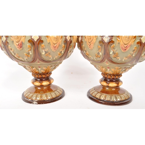 441 - Wilhelm Schiller & Sons - A pair of late 19th century majolica twin handled vases, numbered 2176... 