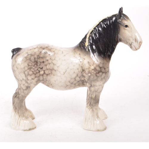 45 - Beswick - A late 20th-century grey china Rocking Cantering Shire horse figurine no. 818. Featuring b... 