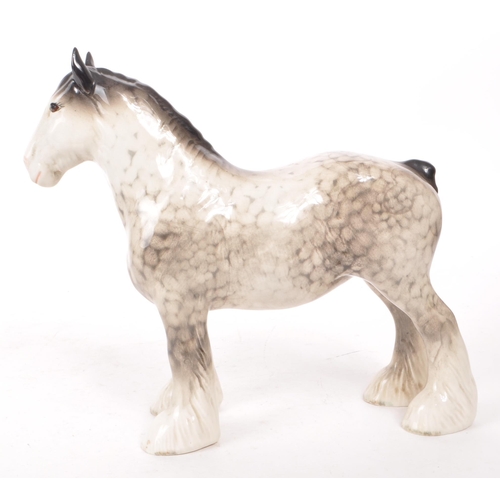 45 - Beswick - A late 20th-century grey china Rocking Cantering Shire horse figurine no. 818. Featuring b... 