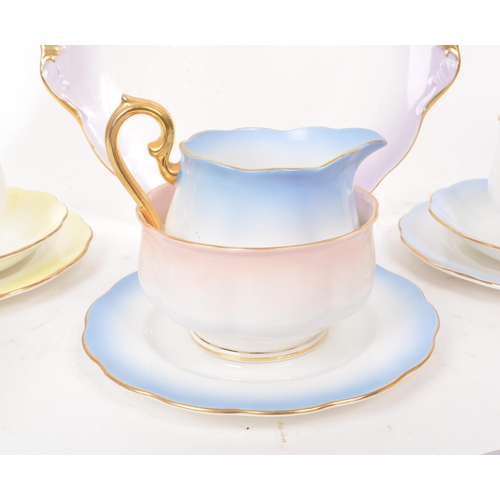 451 - Royal Albert - Rainbow - A collection of mid-century bone china tea service pieces, comprised of six... 