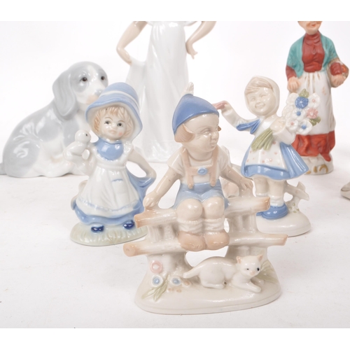 456 - A collection of twelve 20th century assorted porcelain figures, including a 1989 Nao 1110 girl in a ... 