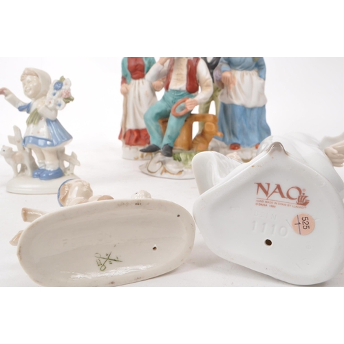 456 - A collection of twelve 20th century assorted porcelain figures, including a 1989 Nao 1110 girl in a ... 