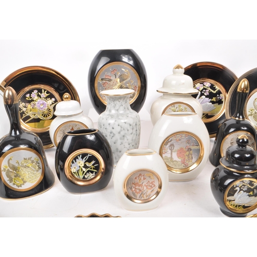 458 - A collection of 20th century Japanese Chokin ornaments, including vases, lidded pots, bells and plat... 