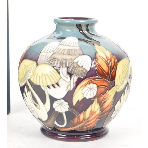 460 - Moorcroft Pottery - A 21st century 2011 'Lionshield' patterned vase, designed by Vicky Lovatt and a ... 