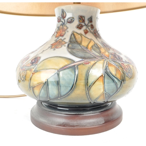 461 - Moorcroft - Bramble - A 20th century Moorcroft Pottery table lamp in the bramble pattern The lam p h... 