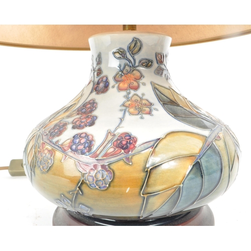 461 - Moorcroft - Bramble - A 20th century Moorcroft Pottery table lamp in the bramble pattern The lam p h... 