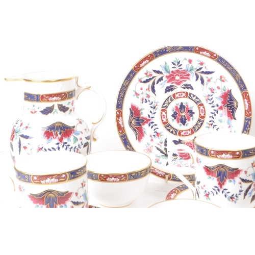 463 - Royal Worcester - 1994 bone china tea service pieces, featuring the Prince Regent pattern, a red and... 