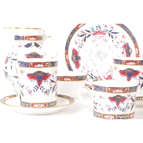 463 - Royal Worcester - 1994 bone china tea service pieces, featuring the Prince Regent pattern, a red and... 