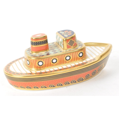 464 - Royal Crown Derby - A 2002 MMIII bone china 'Treasures of Childhood Tugboat' paperweight figure. Fea... 