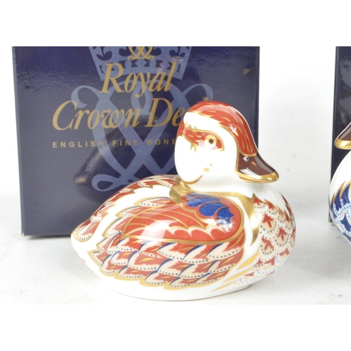 465 - Royal Crown Derby - Two late 20th / 21st century porcelain duck paperweights, comprised of a 2001 MM... 