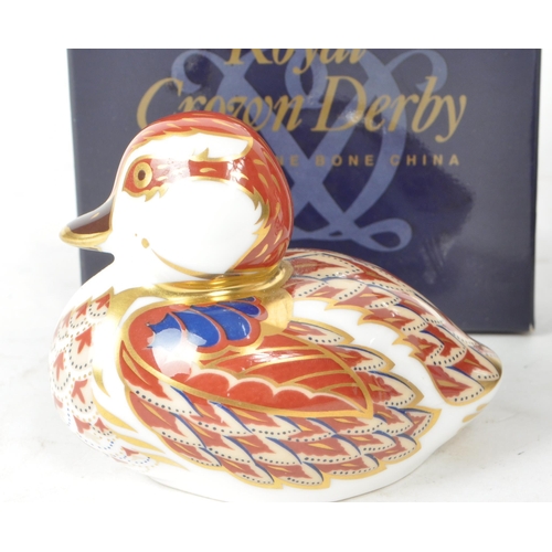 465 - Royal Crown Derby - Two late 20th / 21st century porcelain duck paperweights, comprised of a 2001 MM... 