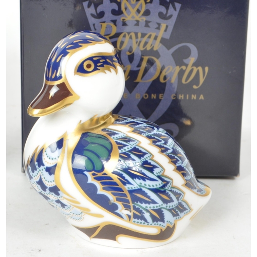 465 - Royal Crown Derby - Two late 20th / 21st century porcelain duck paperweights, comprised of a 2001 MM... 