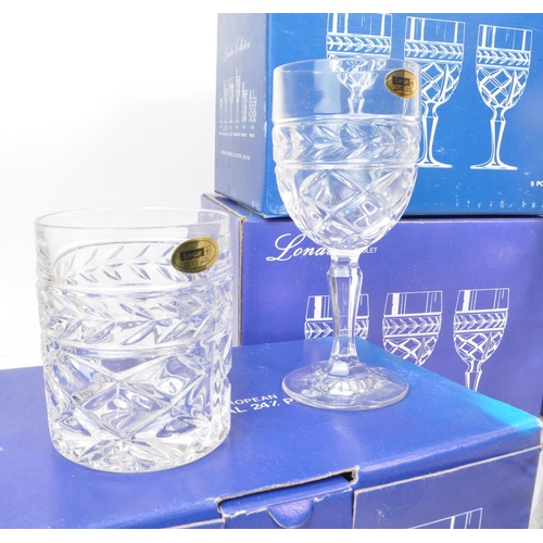 477 - WCI - London - A collection of late 20th century boxed crystal glasses, examples including six LC06 ... 