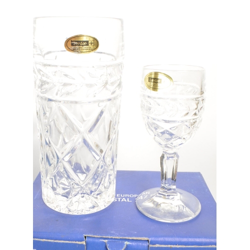 477 - WCI - London - A collection of late 20th century boxed crystal glasses, examples including six LC06 ... 