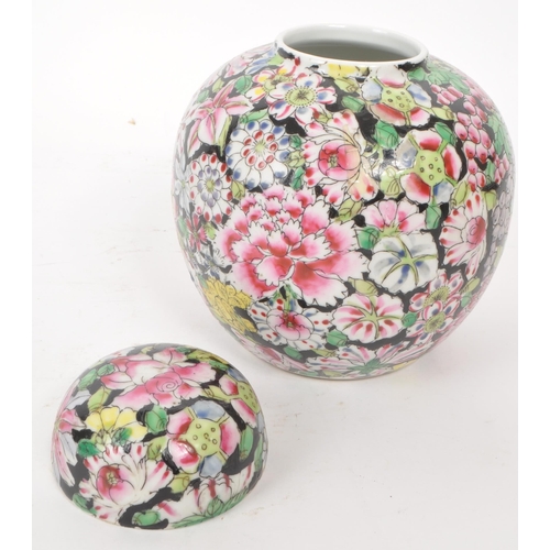 478 - A vintage early 20th century Chinese porcelain lidded ginger jar, with hand-painted pink, green and ... 