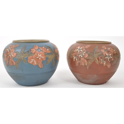 482 - Langley Wares - Two 20th century terracotta / pottery vases, one painted in red and the other painte... 