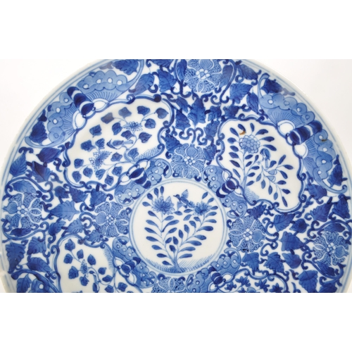 487 - Two 19th century Chinese blue and white decorated porcelain plates. Featuring an ornate floral desig... 