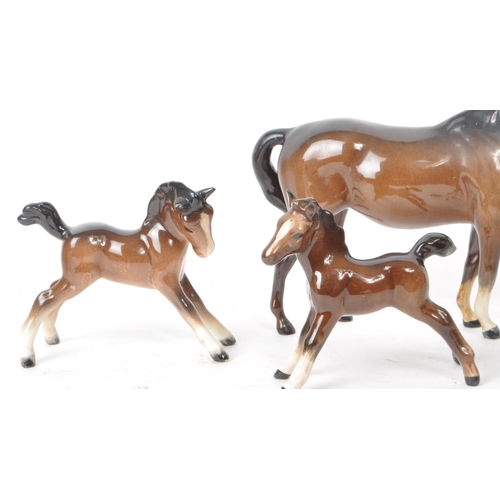 49 - Beswick - A collection of six 20th-century horse and foal figurines, comprising of two adult standin... 