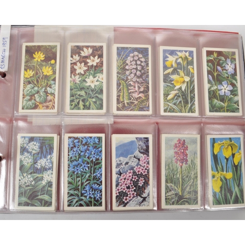 499 - A large collection of 20th century cigarette cards, housed in six albums and featuring examples from... 