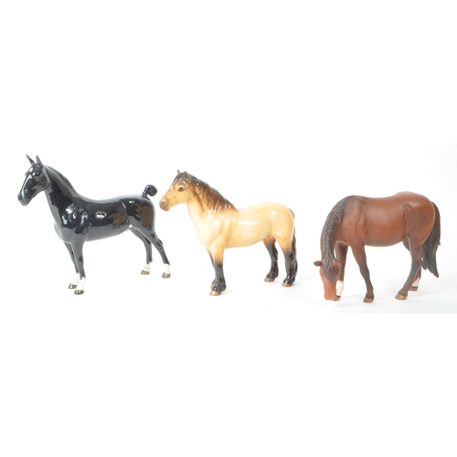 52 - Beswick - A collection of three 20th-century china porcelain horse figurines, comprised of a Champio... 