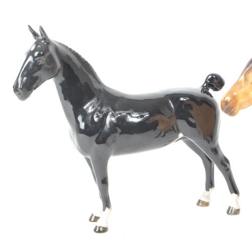 52 - Beswick - A collection of three 20th-century china porcelain horse figurines, comprised of a Champio... 