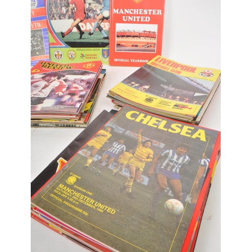 530 -  A large collection of 1980s football programmes, majority being Manchester United, with other examp... 