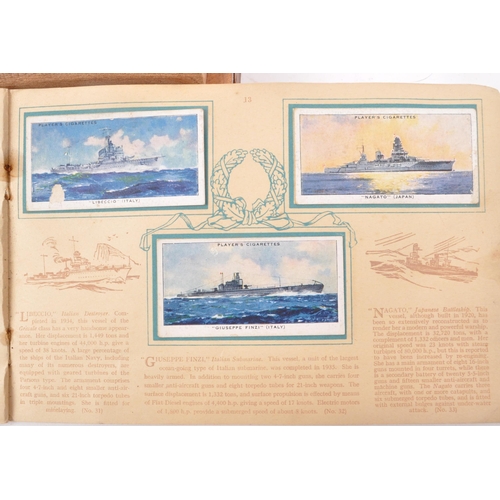 532 - A collection of early 20th century cigarette cards, and two vintage cigarette packets from W.D. &... 