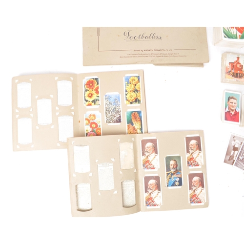 533 - A collection of early 20th century cigarette cards, examples including Wills's, Player's, Churchmans... 