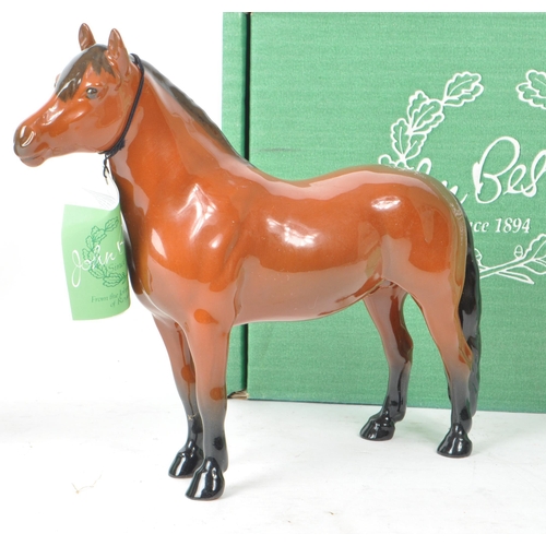 54 - Beswick - A collection of two 20th-century china porcelain horse figurines, comprising of: 'Another ... 