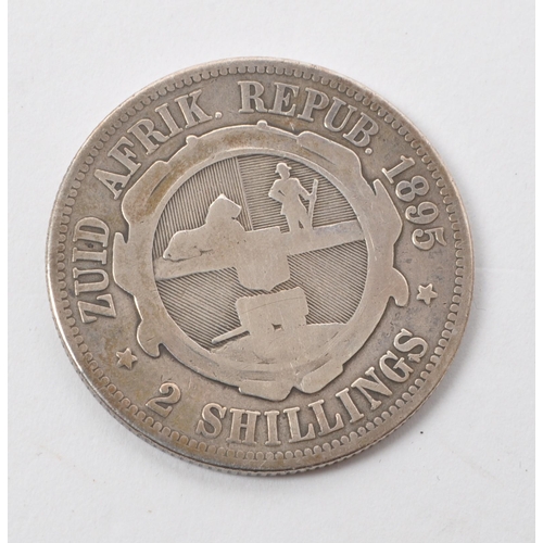 547 - An 1895 South African Republic 2 shillings coin and a 1969 Switzerland 950 Jahre Basler Muenster sil... 