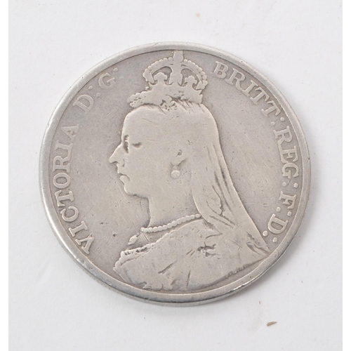 549 - A Victorian 1891 crown coin, with a portrait of Queen Victoria on the reverse, and a 1917 florin, wi... 