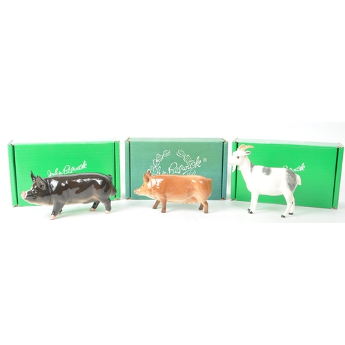 56 - Beswick - A collection of three china porcelain farm animal figurines, comprising of 'Berkshire Boar... 