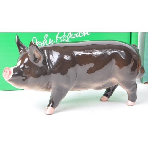 56 - Beswick - A collection of three china porcelain farm animal figurines, comprising of 'Berkshire Boar... 