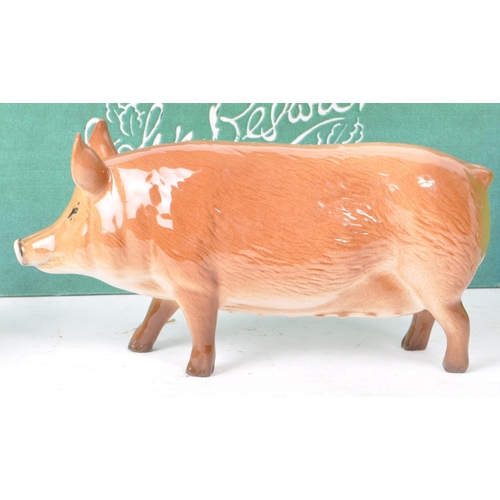 56 - Beswick - A collection of three china porcelain farm animal figurines, comprising of 'Berkshire Boar... 