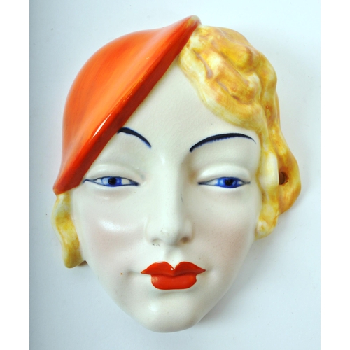 57 - Beswick - A mid-century ceramic wall hanging figure, depicting a girl in a beret, numbered '197', wi... 